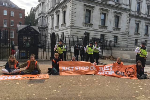 Just Stop Oil protestors outside Downing Street today (Wednesday, October 12). Photo: Just Stop Oil