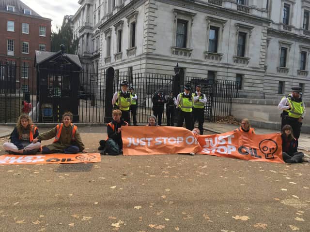 Just Stop Oil protestors outside Downing Street today (Wednesday, October 12). Photo: Just Stop Oil