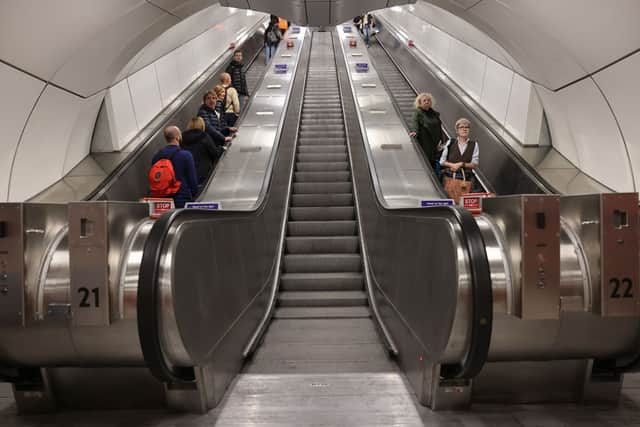 Passengers using new escalators at Bank Station