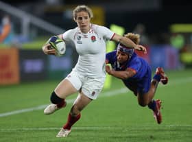 Abby Dow of England is tackled during the Pool C Rugby World Cup 2021 match between France and England 