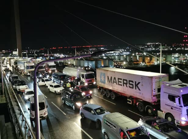 <p>Traffic stopped after two of Just Stop Oil activists scaled the QE2 Bridge (Photo: PA)</p>