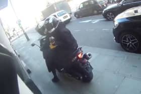 Motorcyclist confronts angle grinder-wielding thugs