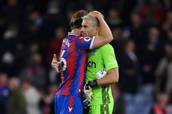  Joachim Andersen of Crystal Palace embraces teammate Vincente Guaita following their side's victory  (Photo by Justin Setterfield/Getty Images)