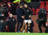 Antonio Conte of Tottenham Hotspur embraces Cristiano Ronaldo of Manchester United (Photo by Michael Regan/Getty Images)