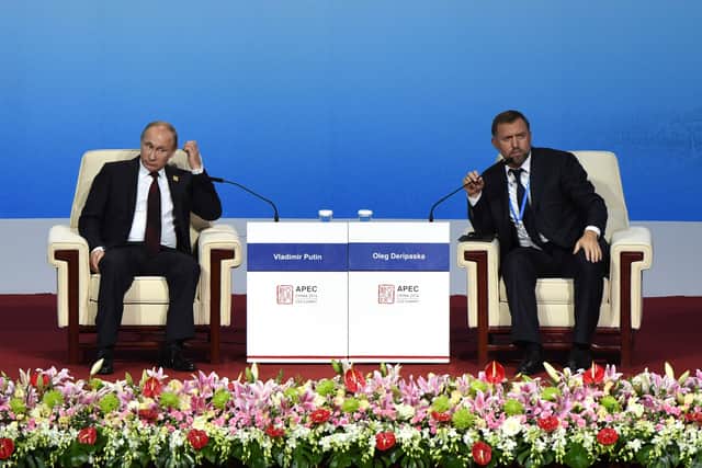 Russia’s President Vladimir Putin with Oleg Deripaska
