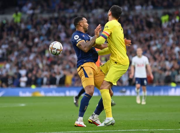 <p>Wilson and Lloris clashed</p>