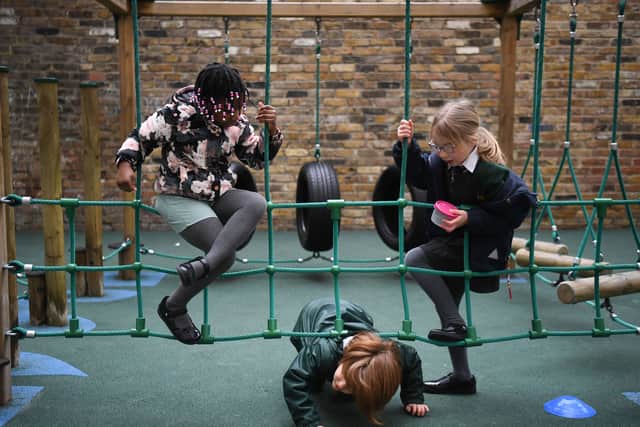 Children playing on a school playground. Photo: Getty