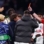 Match referee, Danny Makkelie shows Antonio Conte, Manager of Tottenham Hotspur a red card during the UEFA Champions League  (Photo by Clive Rose/Getty Images)