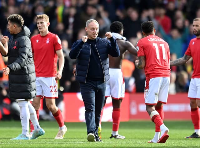 Steve Cooper, Manager of Nottingham Forest celebrates with Jesse Lingard following the Premier League match (Photo by Michael Regan/Getty Images)