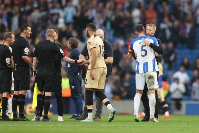 Chelsea Manager Graham Potter embraces Lewis Dunk of Brighton during the Premier League match (Photo by Alex Pantling/Getty Images)