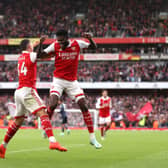 Thomas Partey of Arsenal celebrates with team mate Granit Xhaka after scoring his sides fourth goal during the Premier League match (Photo by Alex Pantling/Getty Images)