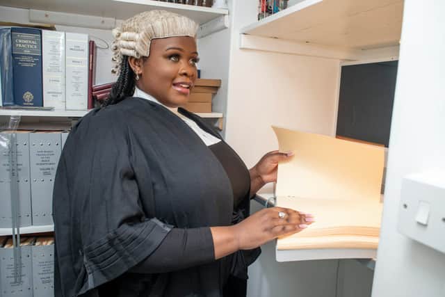 Jessikah Inaba at home, having passed the bar to qualify as the UK’s first blind, black barrister. Photo: SWNS