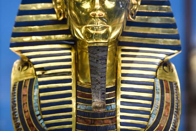 The gold burial mask of the ancient Egyptian New Kingdom Pharaoh Tutankhamun (1334-1325 BC)