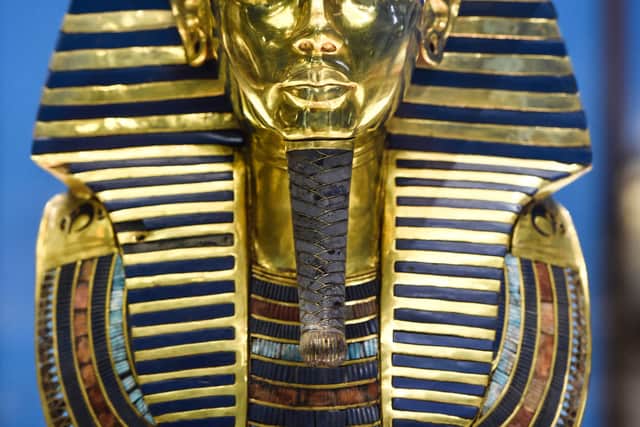 The gold burial mask of the ancient Egyptian New Kingdom Pharaoh Tutankhamun (1334-1325 BC) 