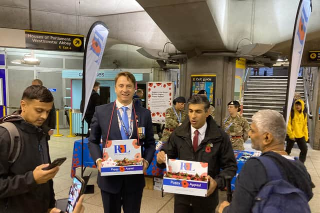 PM Rishi Sunak selling poppies at Westminster Tube Station this morning. Photo: Sara Le Roux