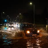 Vehicles negotiate a flooded section of the A1 road on November 02, 2022 in London, England