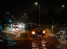 Vehicles negotiate a flooded section of the A1 road on November 02, 2022 in London, England