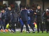 Graham Potter embraces Ben Chilwell of Chelsea after they are substituted off after an injury during the UEFA (Photo by Mike Hewitt/Getty Images)