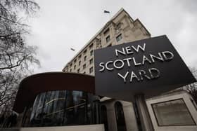 The New Scotland Yard logo is displayed on a revolving sign outside the Curtis Green Building. Photo: Getty
