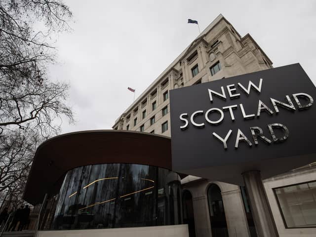 The New Scotland Yard logo is displayed on a revolving sign outside the Curtis Green Building. Photo: Getty