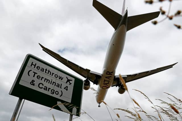 A Qatar airlines flight arrives at Heathrow airport