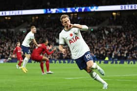 Harry Kane of Tottenham Hotspur celebrates after scoring their team’s first goal during the Premier League match between Tottenham (Photo by Catherine Ivill/Getty Images)
