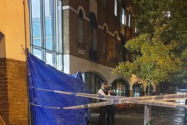 Man dies after fatal fall from telephone kiosk in Stoke Newington police station.