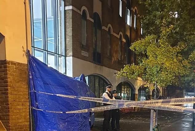 Man dies after fatal fall from telephone kiosk in Stoke Newington police station.