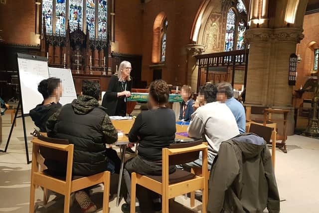 Asylum seekers receiving English lessons at St Dunstan’s Church. Photo: Diocese of London