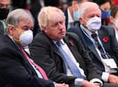 Boris Johnson apparently asleep next to Sir David Attenborough at COP26.