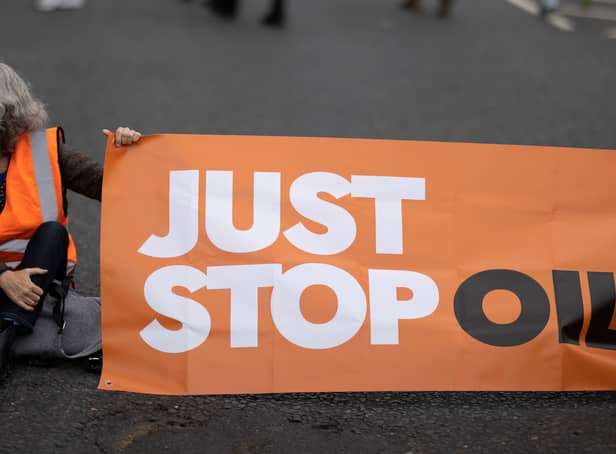 <p>Stock image of a Just Stop Oil banner blocking a road. Photo: Getty</p>