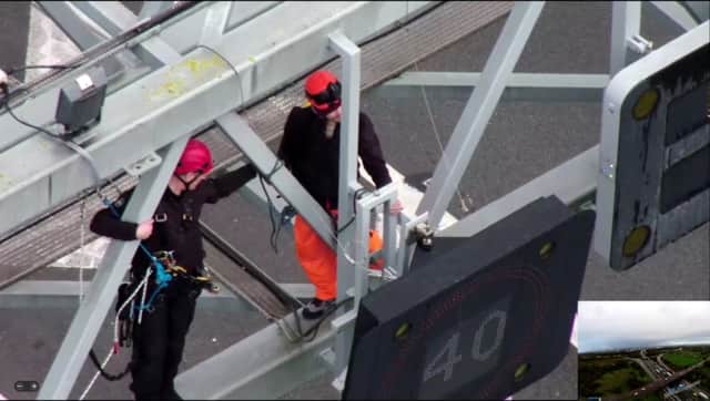 Specialist trained officers are removing protestors from the gantries. Credit: Essex Police