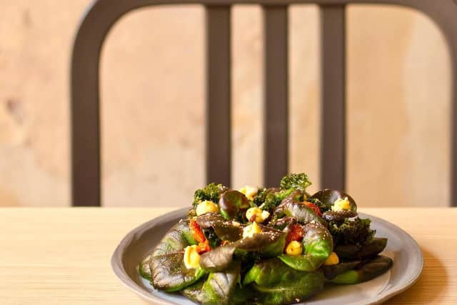 Red butterhead lettuce salad from with miso aioli, cashews and crispy kale at Apricity. Credit: Instagram