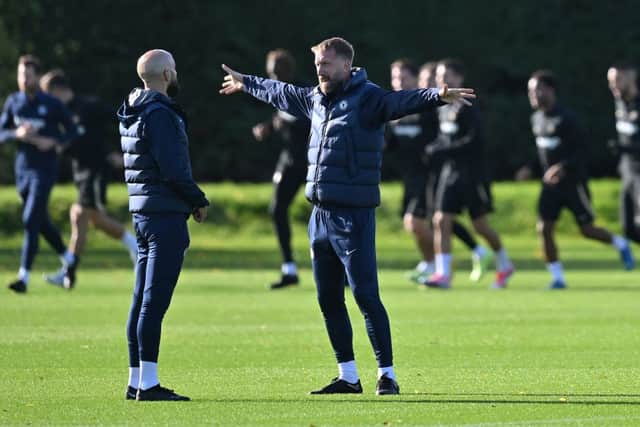 Graham Potter (C) takes a team training session at Chelsea’s Cobham training facility in Stoke D’Abernon, southwest of London (Photo by Glyn KIRK / AFP) (Photo by GLYN KIRK/AFP via Getty Images)