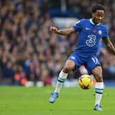 Raheem Sterling controls the ball during the English Premier League football match between Chelsea and Arsenal (Photo by GLYN KIRK/AFP via Getty Images)