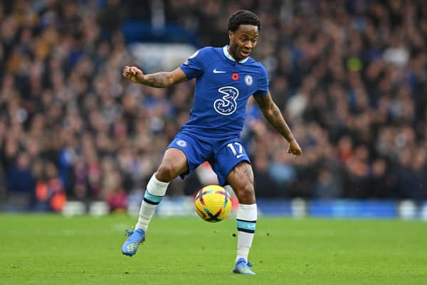 Raheem Sterling controls the ball during the English Premier League football match between Chelsea and Arsenal (Photo by GLYN KIRK/AFP via Getty Images)
