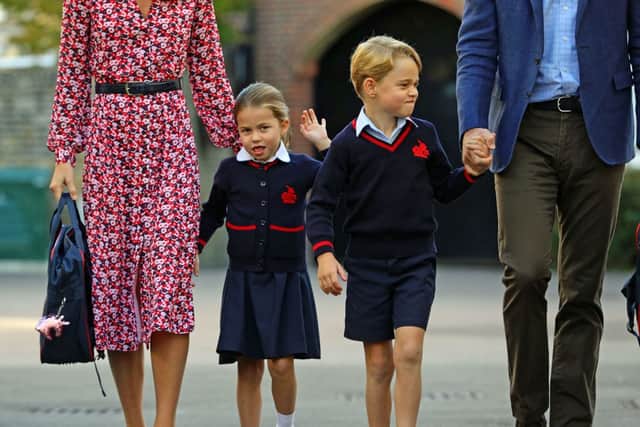 Princess Charlotte (left) and Prince George (right) arriving at Thomas’s Battersea in September 2019
