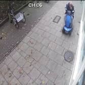 Screen Grab from footage of a pigeon crushed by a man in a scooter.