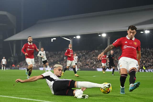 Andreas Pereira slides in against his former club Manchester United.  