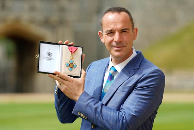  Martin Lewis poses with his CBE (Getty Images)