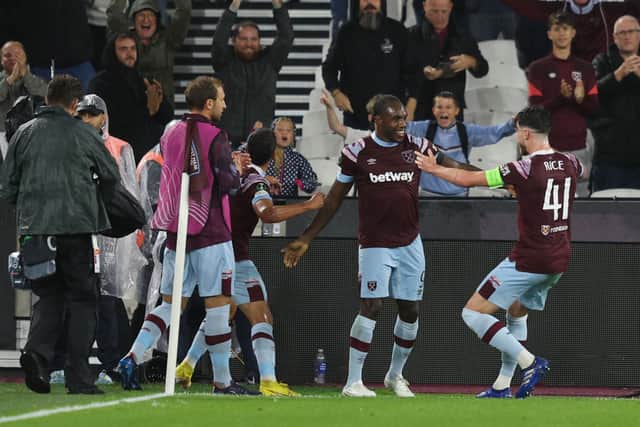 Michail Antonio of West Ham United celebrates with teammate Declan Rice after scoring their team’s third  (Photo by Richard Heathcote/Getty Images)