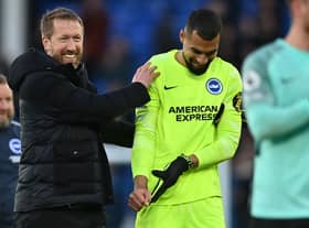  Graham Potter (L) celebrates with Brighton’s Spanish goalkeeper Robert Sanchez (R)  (Photo by PAUL ELLIS/AFP via Getty Images)