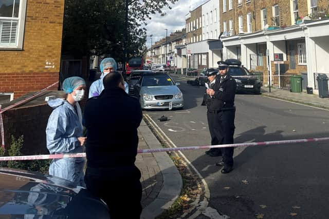 Emergency services on Railton Road, Brixton. Photo: SWNS