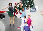 Performing a three-minute routine, Christmas shoppers and commuters were left captivated by the impromptu dance. Photo: SWNS