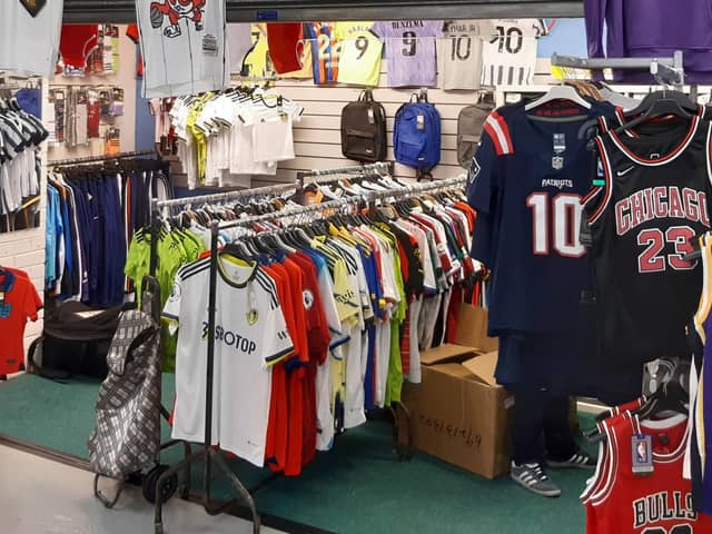 Four tonnes of fake football shirts have been seized by cops during raids ahead of the World Cup - worth a whopping £500,000. Cops raided lock ups and houses across the country in a crackdown on counterfeit goods, which they said are linked to organised criminal groups.