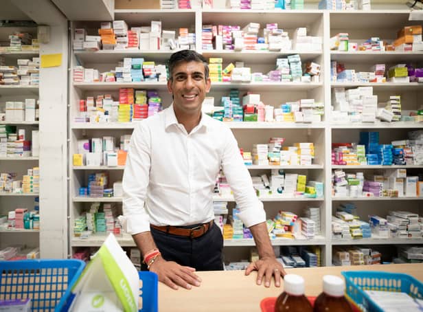 <p>Rishi Sunak during a visit to the pharmacy his mother used to own in Southampton. Photo: Getty</p>