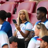 Tolami Benson, partner of Bukayo Saka of England, looks on prior to the FIFA World Cup Qatar 2022 Group B match between England and IR Iran at Khalifa International Stadium on November 21, 2022 in Doha, Qatar. (Photo by Matthias Hangst/Getty Images)