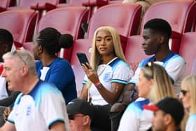 Tolami Benson, partner of Bukayo Saka of England, looks on prior to the FIFA World Cup Qatar 2022 Group B match between England and IR Iran at Khalifa International Stadium on November 21, 2022 in Doha, Qatar. (Photo by Matthias Hangst/Getty Images)