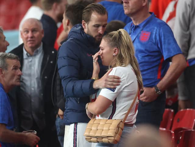 England's forward Harry Kane (L) consoles his wife Katie (R) after Italy won the UEFA EURO 2020 final football match between Italy and England at the Wembley Stadium in London on July 11, 2021. (Photo by CARL RECINE / POOL / AFP) (Photo by CARL RECINE/POOL/AFP via Getty Images)
