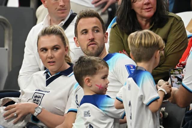 Harry and Katie Kane with their children at a FIFA World Cup Qatar 2022 Group B match. (Photo by Clive Mason/Getty Images)h  